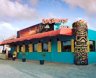 Exterior of Coconuts on the Beach restaurant and bar in Cocoa Beach, a beachfront dining spot on Florida’s Space Coast.