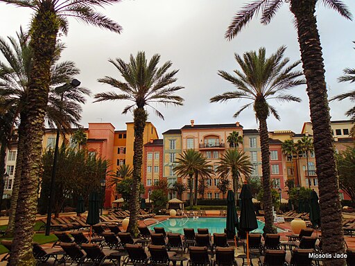 Portofino Bay Hotel, one of the luxurious Universal Studios hotels in Orlando Florida, showcasing Mediterranean-inspired architecture surrounded by palm trees.