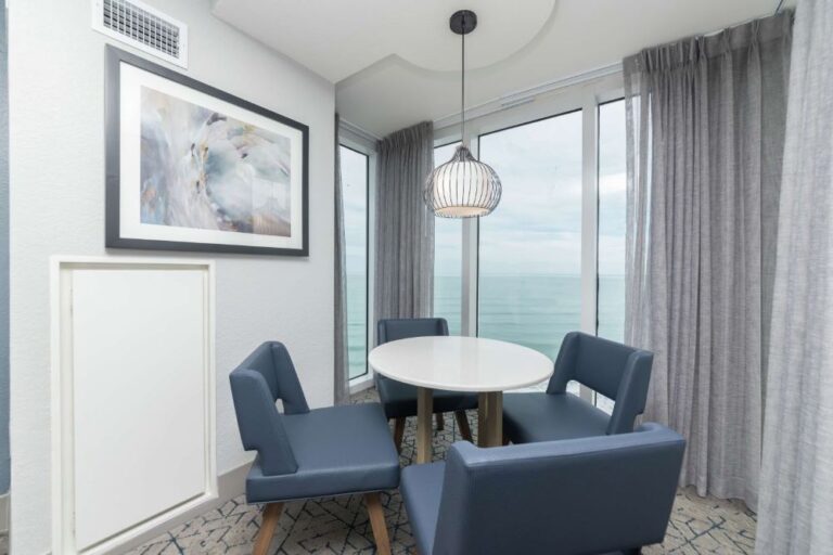 Cozy dining area with ocean views at the Hilton Melbourne Oceanfront