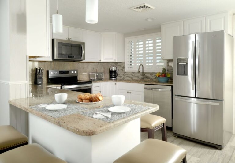 Modern kitchen interior at Tuckaway Shores Resort with dining area.