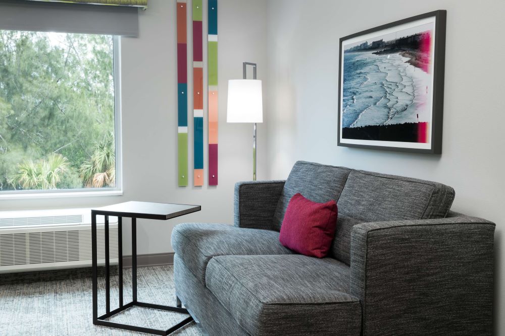 Modern guest room at Hampton Inn Cape Canaveral with comfortable furnishings near rocket launch viewing sites on Florida's Space Coast.