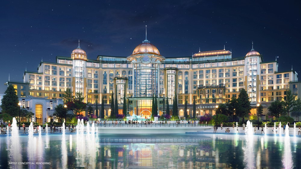 Exterior of Universal Helios Grand Hotel near Epic Universe Orlando, featuring Mediterranean architecture, palm trees, and elegant resort entrance